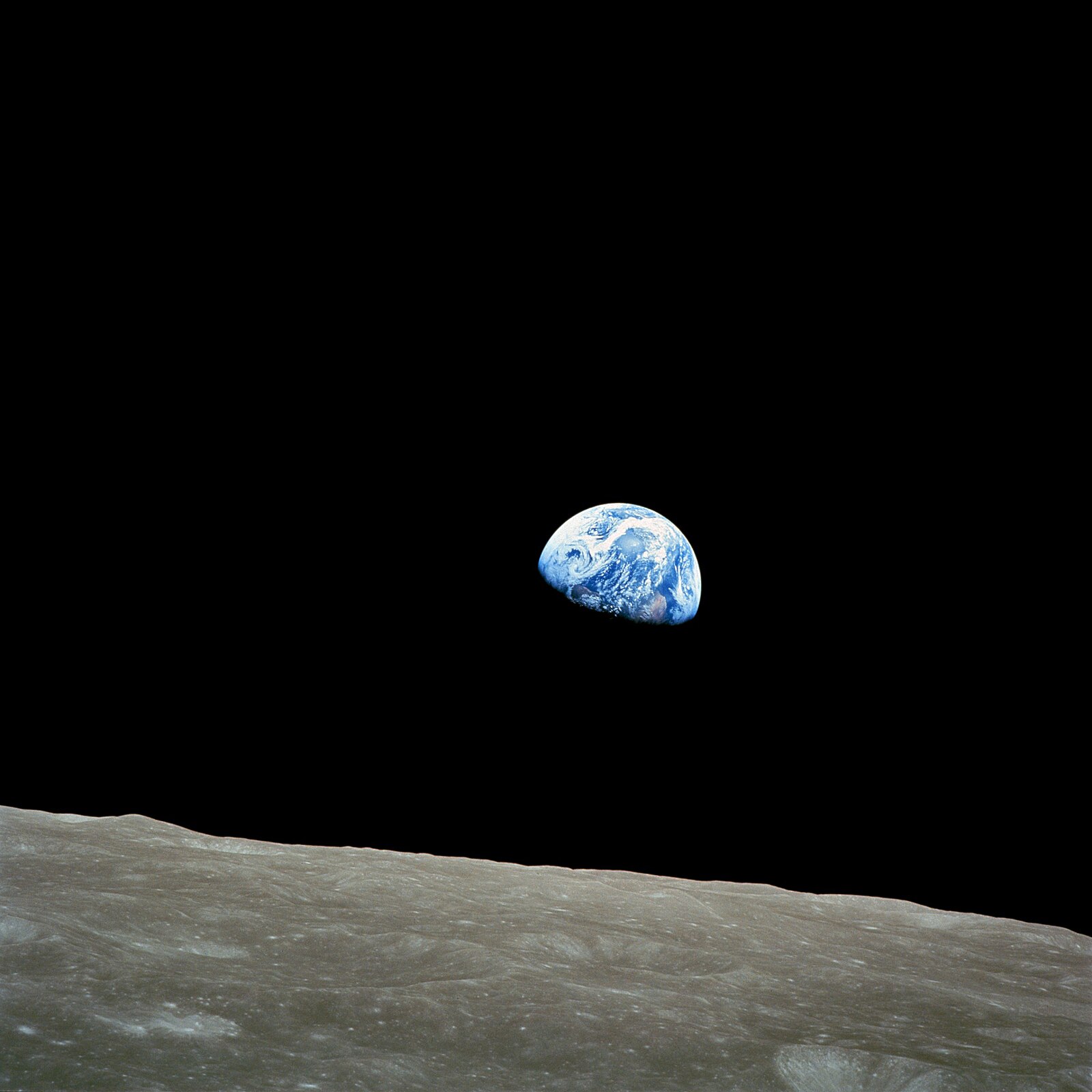 Earthrise — Earth rising above the lunar horizon, photographed by astronaut William Anders during Apollo 8, December 24, 1968