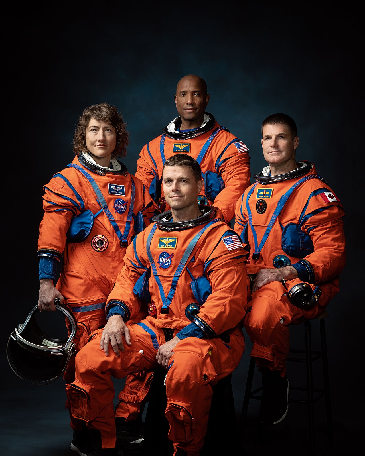 The Artemis II crew — Commander Reid Wiseman, Pilot Victor Glover, Mission Specialist Christina Koch, and Mission Specialist Jeremy Hansen — in their Orion crew survival suits